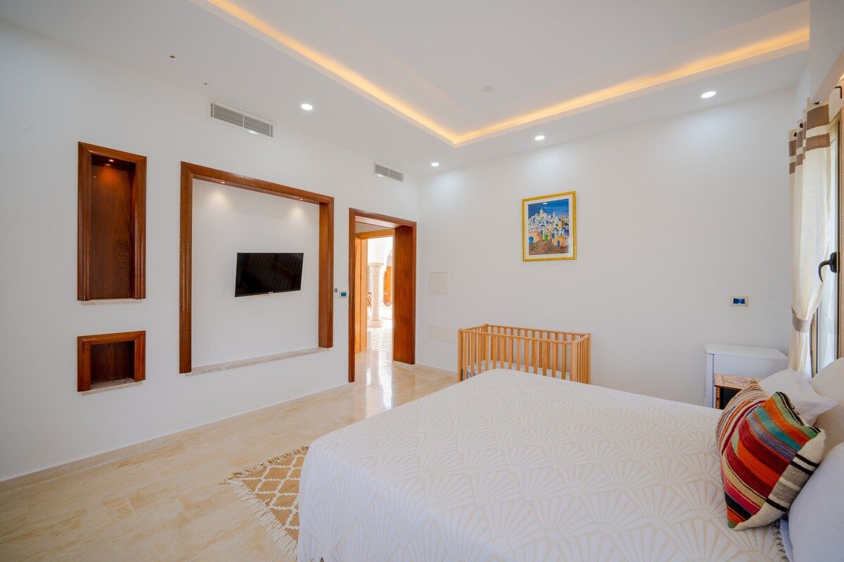 Suite de la villa Dar Aïcha, lit double et linge blanc